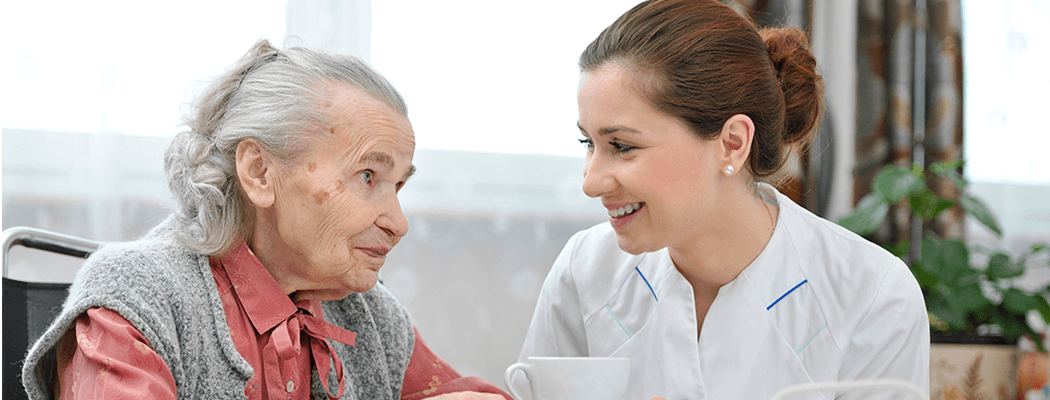 Assisted Living nurse with elderly lady