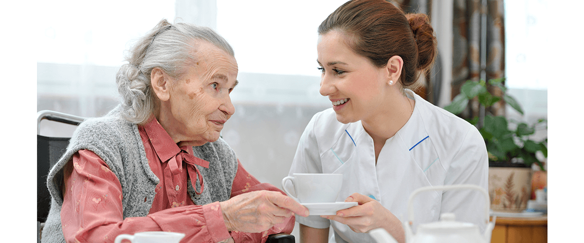 Assisted Living nurse with elderly lady