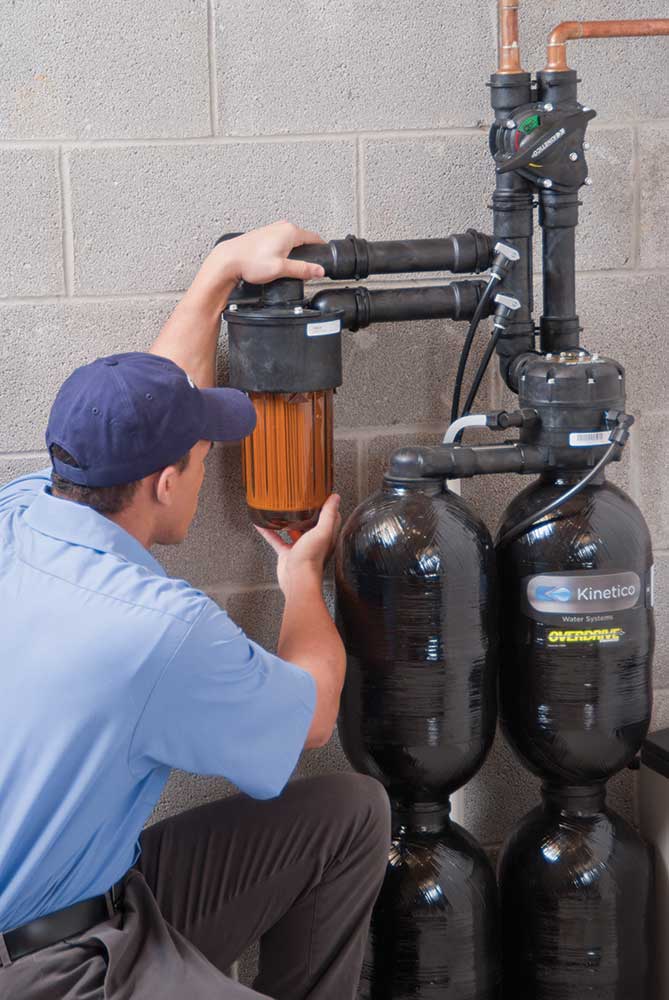 Service-Technician-Inspecting-Softener-HR Service Technician Inspection