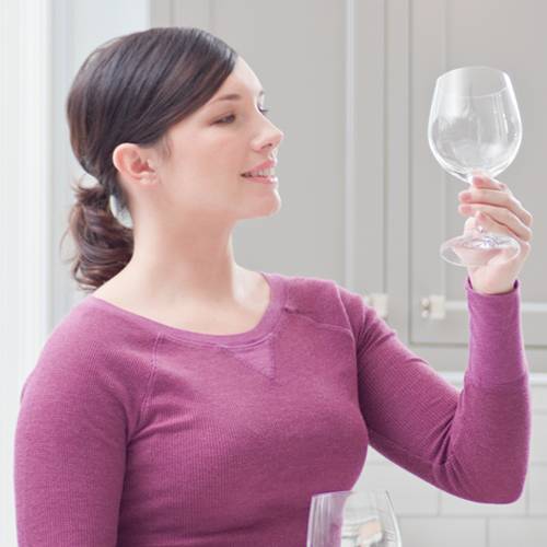 Woman looking at glassware