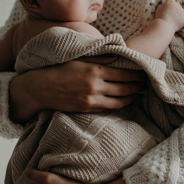 Mother Holding Sick Baby