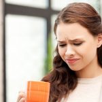 Woman frowning at water