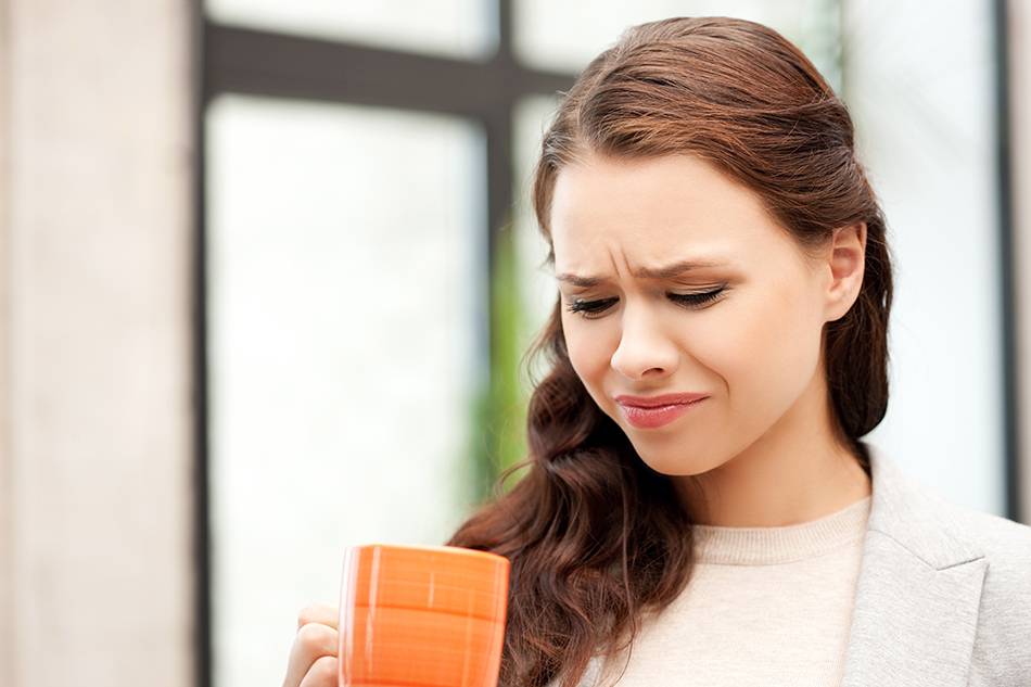 Woman frowning at water