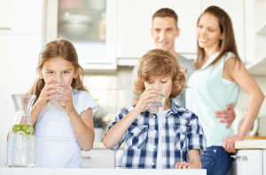 family drinking water
