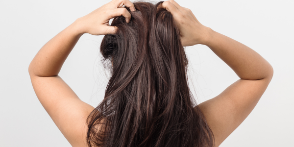 Woman with Dry Hair because of hard water